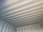 the interior of a shipping container showing the roof